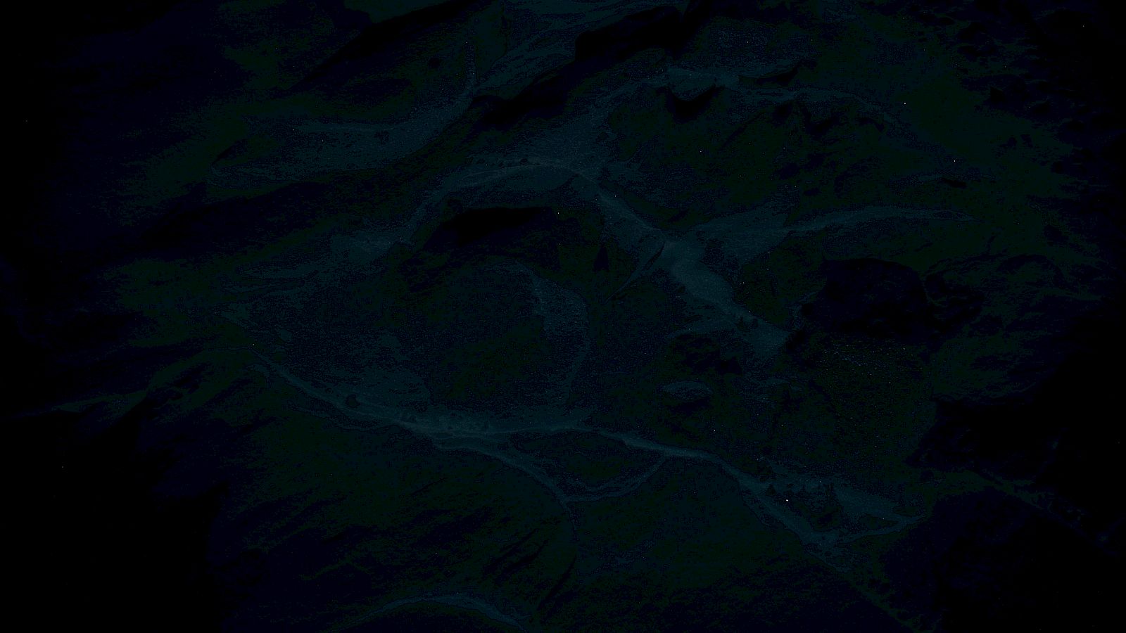 The image is too dark to clearly identify any objects or elements in it.